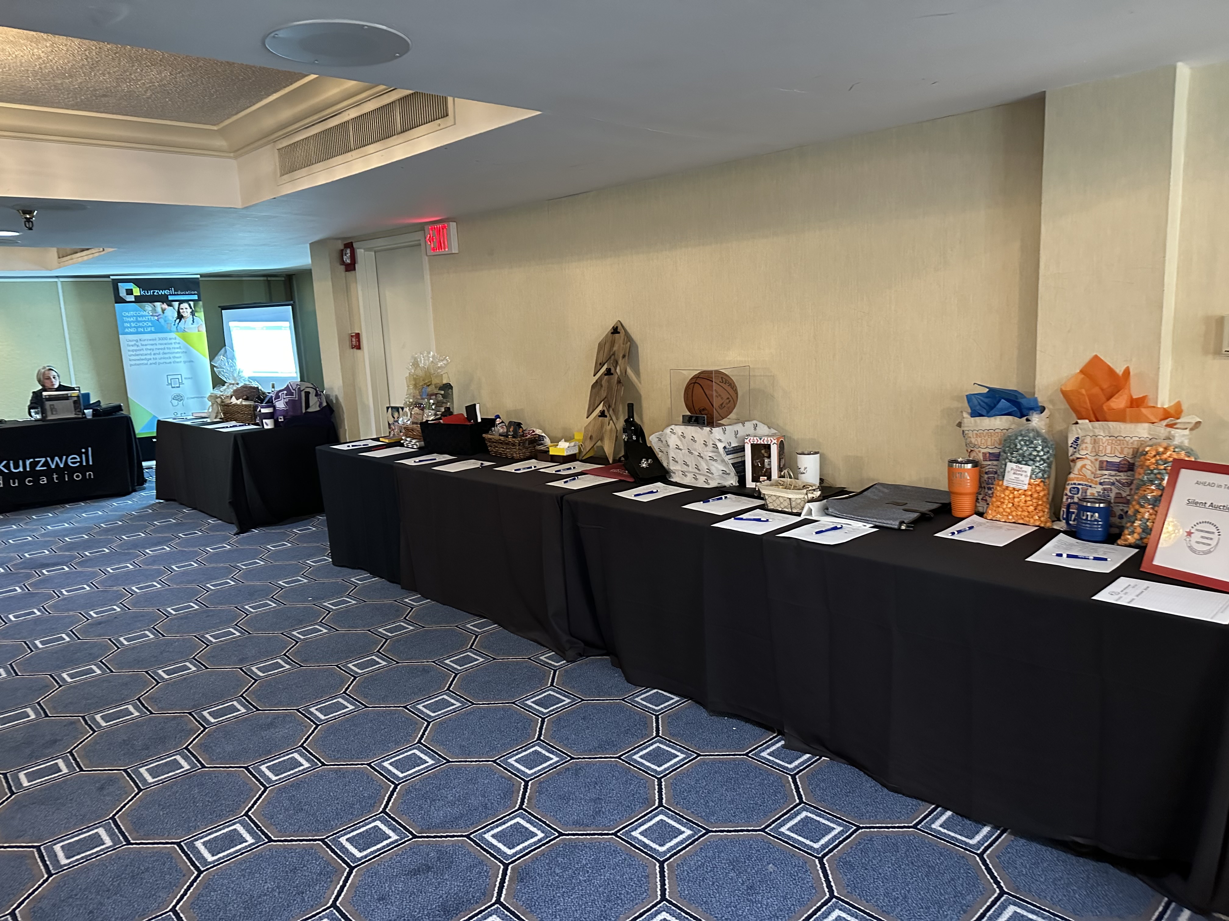 Photo of Silent Auction tables at Spring 2023 AHEAD in Texas conference