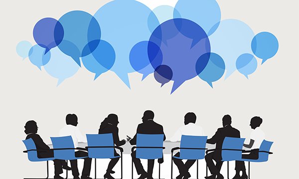 blue, white and black picture of a group of people meeting around a desk with word bubbles above their heads.